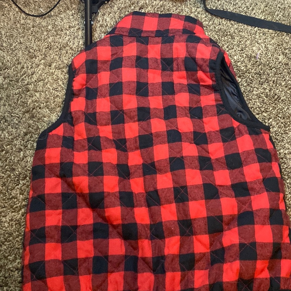 Red checkered snow vest
